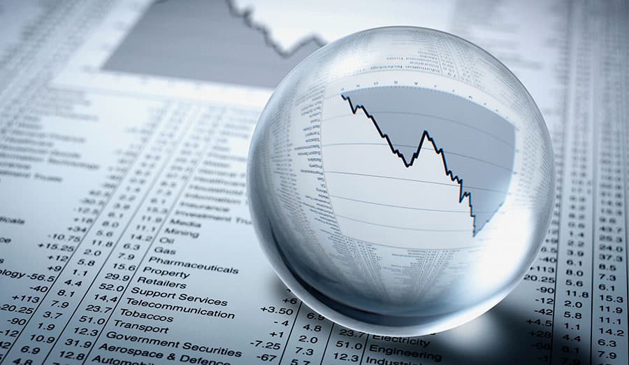 Crystal ball, descending line graph and share prices. Image shot 2009. Exact date unknown.